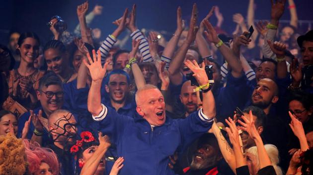 Designer Jean Paul Gaultier reacts at the end of his Haute Couture Spring/Summer 2020 collection show in Paris, France. Gaultier bid farewell to the catwalk with a joyful fashion extravaganza featuring burlesque stars such as Dita Von Teese on the runway and performances by singer Boy George. (Charles Platiau / REUTERS) Designer Jean Paul Gaultier reacts at the end of his Haute Couture Spring/Summer 2020 collection show in Paris, France. Gaultier bid farewell to the catwalk with a joyful fashion extravaganza featuring burlesque stars such as Dita Von Teese on the runway and performances by singer Boy George. (Charles Platiau / REUTERS)