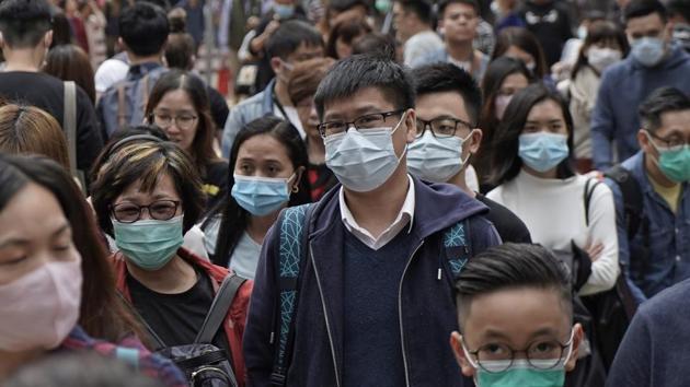 People wear masks on a street in Hong Kong, Friday, Jan. 24, 2020 to celebrate the Lunar New Year which marks the Year of the Rat in the Chinese zodiac. (AP photo) People wear masks on a street in Hong Kong, Friday, Jan. 24, 2020 to celebrate the Lunar New Year which marks the Year of the Rat in the Chinese zodiac. (AP photo)