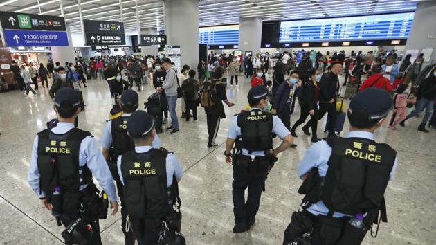Wuhan and Beijing have cancelled public events that usually attract hundreds of thousands of people to temples during the New Year holiday.(AP)