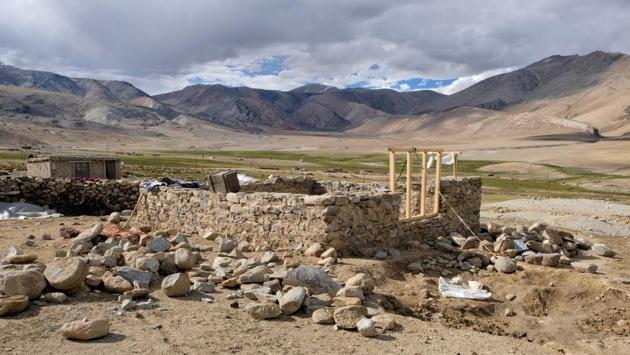 A stone house under construction at the Changpa nomadic camp, near Korzok village. Changing weather patterns and other factors have pushed many on the inhospitable plateau to abandon their traditions and migrate to villages and cities in the Ladakh region in search of alternative sources of income. (Noemi Cassanelli / AFP)