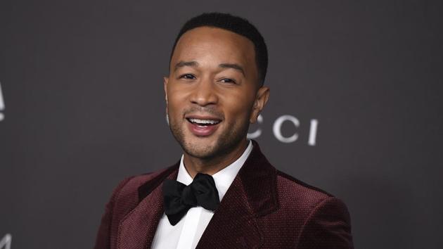 John Legend is nominated for a Grammy for best traditional pop vocal album with his holiday album, A Legendary Christmas.(Jordan Strauss/Invision/AP)