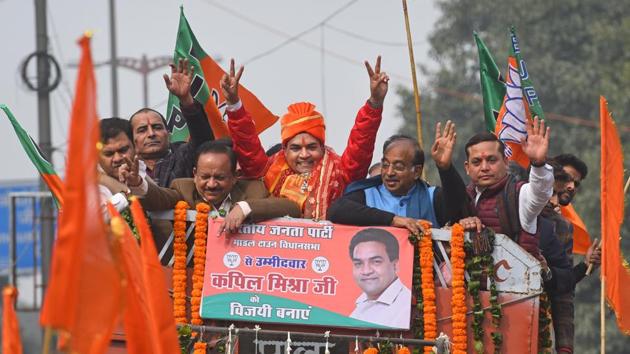 BJP candidate from Model Town Kapil Mishra during a road show before filing the nomination for Delhi assembly election, on Tuesday.(Sanchit Khanna/HT Photo)