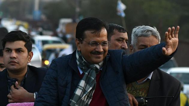 Delhi Chief Minister Arvind Kejriwal waves during a roadshow at Okhla in New Delhi on Thursday.(Biplov Bhuyan/HT Photo) Delhi Chief Minister Arvind Kejriwal waves during a roadshow at Okhla in New Delhi on Thursday.(Biplov Bhuyan/HT Photo)