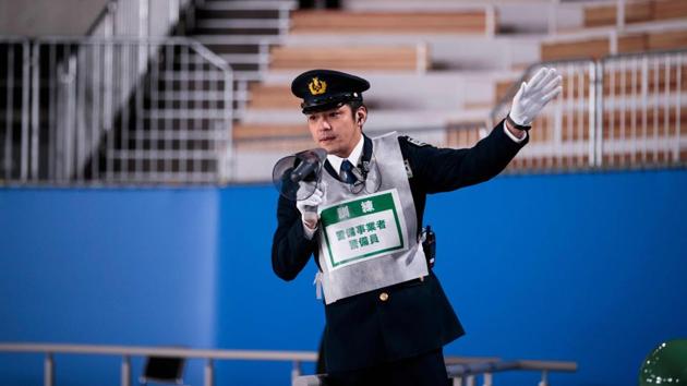 It’s 9.15am on July 26 and excitement is building at the Tokyo Aquatics centre (pictured) as the first swimming medals are up for grabs. Without warning a 7.3-magnitude earthquake rips through Tokyo Bay, the ground shakes violently causing citywide damage, panic and casualties. Fortunately, this is just an imagined scenario at a disaster drill, as Tokyo 2020 organisers prepare for the worst. (Behrouz Mehri / AFP)