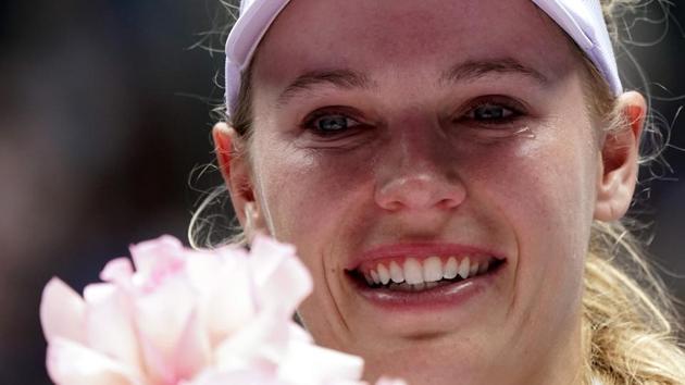 Denmark’s Caroline Wozniacki reacts after losing the match against Tunisia’s Ons Jabeur.(REUTERS)