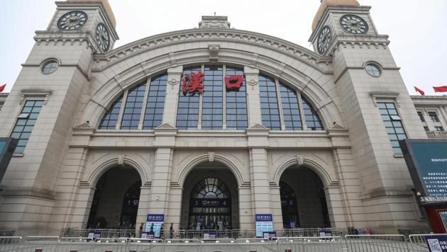 Barricades block access to the closed Hankou Railway Station in Wuhan. China is trying to limit further spread of the coronavirus by preventing people from leaving Wuhan, the city of 11 million where the outbreak originated, and 12 other cities in central Hubei province. (Chinatopix via AP) Barricades block access to the closed Hankou Railway Station in Wuhan. China is trying to limit further spread of the coronavirus by preventing people from leaving Wuhan, the city of 11 million where the outbreak originated, and 12 other cities in central Hubei province. (Chinatopix via AP)