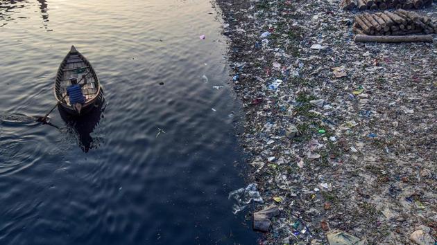 A man paddles on a boat as plastic bags float on the water surface of the Buriganga river in Dhaka. Bangladesh’s High Court has ordered the shutdown of 231 factories that have contributed to Dhaka’s main river becoming one of the world’s most polluted. (Munir uz Zaman / AFP) A man paddles on a boat as plastic bags float on the water surface of the Buriganga river in Dhaka. Bangladesh’s High Court has ordered the shutdown of 231 factories that have contributed to Dhaka’s main river becoming one of the world’s most polluted. (Munir uz Zaman / AFP)