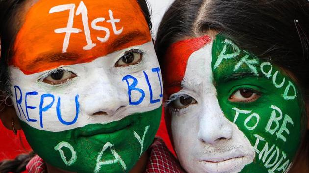 Jammu: School students paint their faces in tricolour as they celebrate the Republic Day, in Jammu, Saturday, Jan. 25, 2020. (PTI Photo) (PTI1_25_2020_000053A) (PTI)