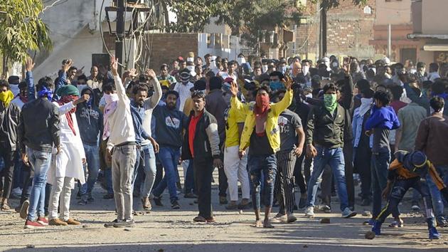 Jabalpur: A protestor hurls stones during an alleged confrontation between two communities during a pro-CAA protest in Jabalpur, Sunday, Jan. 26, 2020. (PTI Photo)(PTI1_26_2020_000373A)(PTI) Jabalpur: A protestor hurls stones during an alleged confrontation between two communities during a pro-CAA protest in Jabalpur, Sunday, Jan. 26, 2020. (PTI Photo)(PTI1_26_2020_000373A)(PTI)