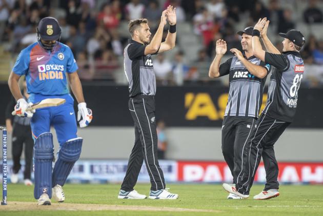 New Zealand's bowler Tim Southee high fives team mates after dismissing India's Rohit Sharma. (AP) New Zealand's bowler Tim Southee high fives team mates after dismissing India's Rohit Sharma. (AP)