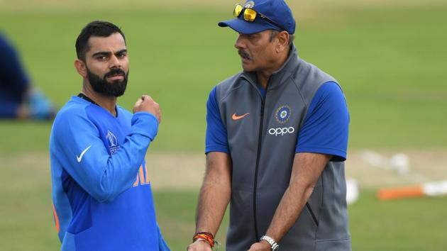 India captain Virat Kohli chats with coach Ravi Shastri.(Getty Images)