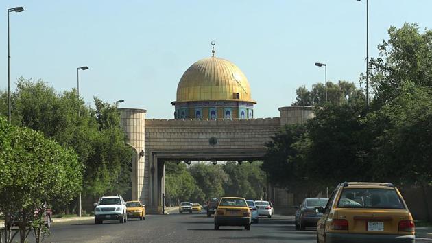 Vehicles move through the Green Zone in Baghdad, Iraq,(AP FILE)