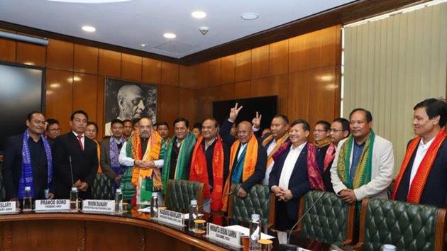 Home Minister Amit Shah during the signing of the accord with Assam CM Sonowal, minister HB Sarma and Bodoland stakeholders.(Twitter/@narendramodi) Home Minister Amit Shah during the signing of the accord with Assam CM Sonowal, minister HB Sarma and Bodoland stakeholders.(Twitter/@narendramodi)
