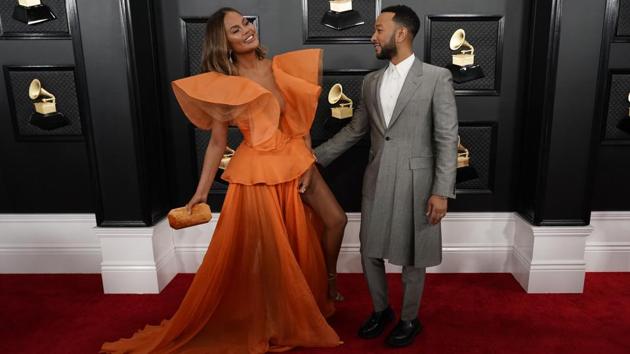 62nd Grammy Awards – Arrivals – Los Angeles, California, U.S., January 26, 2020 – Chrissy Teigan and John Legend. REUTERS/Mike Blake (REUTERS)