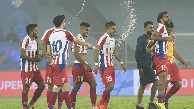 ATK players celebrate after wining against North East United FC during ISL match at Salt Lake Stadium in Kolkata.(PTI) ATK players celebrate after wining against North East United FC during ISL match at Salt Lake Stadium in Kolkata.(PTI)