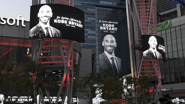 Electronic signs honor Kobe Bryant at LA Live in Los Angeles on Sunday.(AP) Electronic signs honor Kobe Bryant at LA Live in Los Angeles on Sunday.(AP)