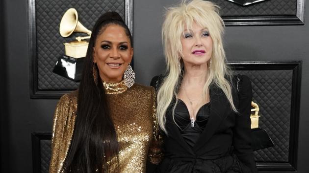 62nd Grammy Awards – Arrivals – Los Angeles, California, U.S., January 26, 2020 – Sheila E. and Cyndi Lauper. REUTERS/Mike Blake (REUTERS)