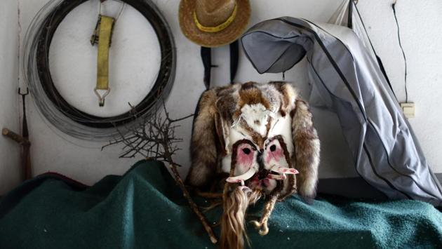 A mask of "Las Carantonas" is displayed prior of a festival in Acehuche, Spain. (Manu Fernandez / AP)