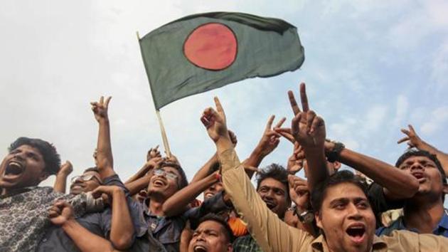 Bangladeshi cricket fans wave their national flag and cheer after the Bangladesh cricket team clinched a historic four-wicket win against Sri Lanka in their 100th test match, as they celebrate in Dhaka, Bangladesh, Sunday, March 19, 2017. (Representational image)(AP)