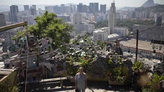 Ale Roque at the Yellow House cultural centre. Rio’s neighbourhoods have among the least vegetation in Brazil; 80 of them have less than 1% tree cover. This month, the city’s temperatures breached 40 degrees Celsius, but people focus instead on “apparent temperature,” a measure that includes wind and humidity that spiked as high as 54.8 degrees C on January 11, just shy of the record. (Silvia Izquierdo / AP) Ale Roque at the Yellow House cultural centre. Rio’s neighbourhoods have among the least vegetation in Brazil; 80 of them have less than 1% tree cover. This month, the city’s temperatures breached 40 degrees Celsius, but people focus instead on “apparent temperature,” a measure that includes wind and humidity that spiked as high as 54.8 degrees C on January 11, just shy of the record. (Silvia Izquierdo / AP)
