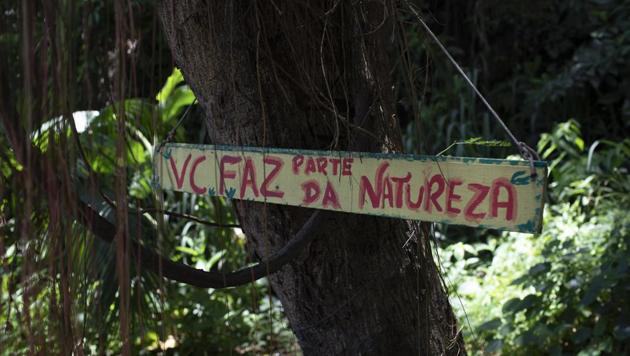 A sign reads “You take part of nature”. Roque argues that if kids spend their days exposed only to alleys, bullets, drugs and trash, they’ll struggle to contribute to the world. They need places to play and pick flowers. “How are you going teach kids about Mother Nature if they don’t have contact with it?” she said. “This could be happening in places all over the world, in other favelas, other little areas.” (Silvia Izquierdo / AP) A sign reads “You take part of nature”. Roque argues that if kids spend their days exposed only to alleys, bullets, drugs and trash, they’ll struggle to contribute to the world. They need places to play and pick flowers. “How are you going teach kids about Mother Nature if they don’t have contact with it?” she said. “This could be happening in places all over the world, in other favelas, other little areas.” (Silvia Izquierdo / AP)