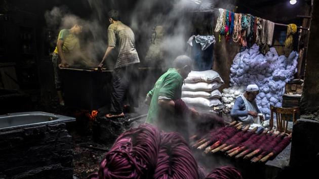 Salama’s loyal clients come from all over Egypt, and even from Sudan and the United States. But he says competition from foreign products has hurt the home-grown textile industry. The rise in the dye prices globally has also taken a toll on the niche industry. (Khaled Desouki / AFP) Salama’s loyal clients come from all over Egypt, and even from Sudan and the United States. But he says competition from foreign products has hurt the home-grown textile industry. The rise in the dye prices globally has also taken a toll on the niche industry. (Khaled Desouki / AFP)