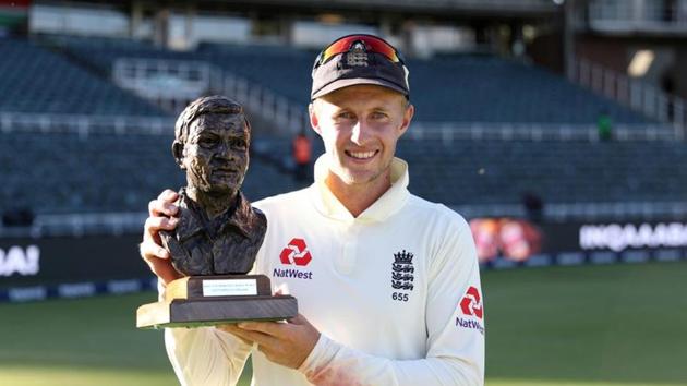 England's Joe Root poses for a photograph as he celebrates with the Basil D'Oliveira trophy(REUTERS)