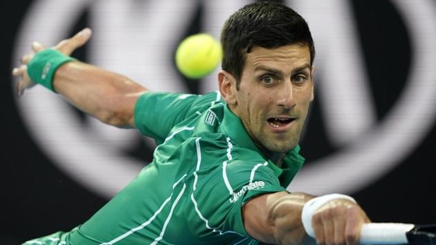 Serbia's Novak Djokovic in action during his match against Canada's Milos Raonic.(REUTERS)