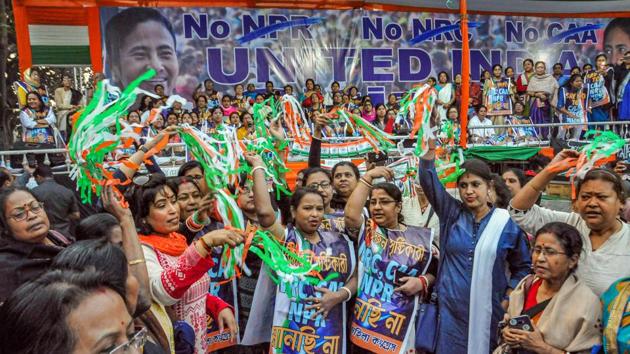 Trinamool Mohila Congress activists celebrate after a resolution was passed against the Citizenship Amendment Act (CAA) in its assembly, in Kolkata.(PTI) Trinamool Mohila Congress activists celebrate after a resolution was passed against the Citizenship Amendment Act (CAA) in its assembly, in Kolkata.(PTI)