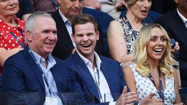 Allan Border, Steve Smith and his wife Dani Willis watch the Men’s Singles Quarterfinal match between Rafael Nadal of Spain and Dominic Thiem of Austria on day ten of the 2020 Australian Open.(Getty Images)