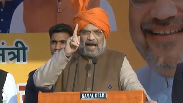 Home Minister Amit Shah addressing a poll rally in Najafgarh in Delhi on Jan 29, 2020. (Photo @BJP4India)