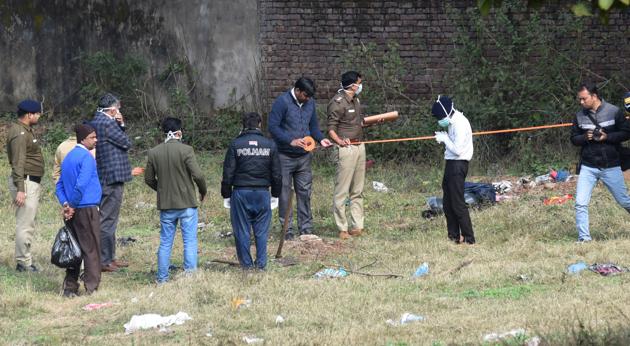 Police exhuming the body of five-month-old Kusum in Sector 25; (right) mother Roopa, 22