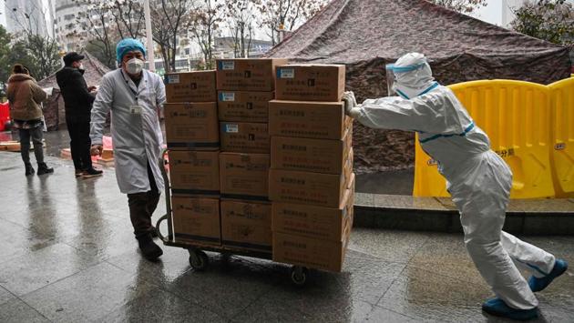 The city of 11 million is the epicentre of the new SARS-like epidemic and has been in quarantine since Thursday—with nobody allowed to leave as the government tries to contain its spread. At one Wuhan hospital AFP visited, there were long queues of sick patients, many coughing, with overwhelmed staff unable to process them quickly. (Hector RETAMAL / AFP) The city of 11 million is the epicentre of the new SARS-like epidemic and has been in quarantine since Thursday—with nobody allowed to leave as the government tries to contain its spread. At one Wuhan hospital AFP visited, there were long queues of sick patients, many coughing, with overwhelmed staff unable to process them quickly. (Hector RETAMAL / AFP)