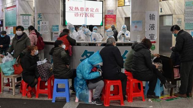 Many people carried their own plastic stools to sit on, while one pragmatic man had brought a lounge chair with him. Volunteers were taking patients to the hospital on Sunday after cars were ordered off the road. Authorised neighbourhood committees were transporting patients instead. “There are no cars, so we are responsible for taking them there,” said one volunteer, 40-year-old Yin Yu. (Hector RETAMAL / AFP) Many people carried their own plastic stools to sit on, while one pragmatic man had brought a lounge chair with him. Volunteers were taking patients to the hospital on Sunday after cars were ordered off the road. Authorised neighbourhood committees were transporting patients instead. “There are no cars, so we are responsible for taking them there,” said one volunteer, 40-year-old Yin Yu. (Hector RETAMAL / AFP)