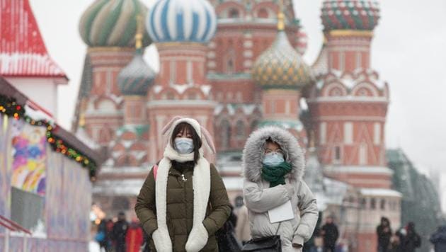 Tourists wear protective face masks as they walk in Red Square near the Kremlin in Moscow, Russia, on Tuesday, Jan. 28, 2020. The outbreak of the deadly coronavirus threatens to derail a fragile stabilization in the world economy, which had appeared poised to benefit from the phase one U.S.-China trade deal, and signs of a tech turnaround.(Bloomberg) Tourists wear protective face masks as they walk in Red Square near the Kremlin in Moscow, Russia, on Tuesday, Jan. 28, 2020. The outbreak of the deadly coronavirus threatens to derail a fragile stabilization in the world economy, which had appeared poised to benefit from the phase one U.S.-China trade deal, and signs of a tech turnaround.(Bloomberg)