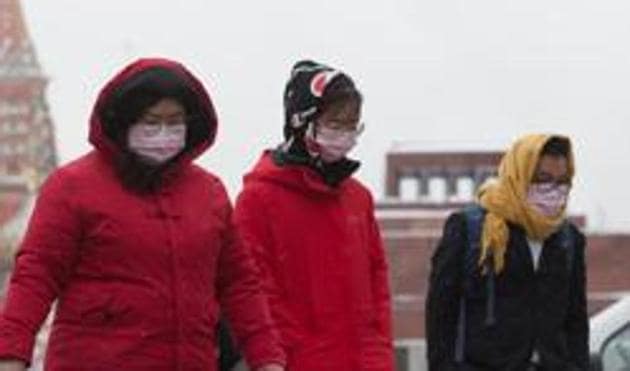 In the picture, tourists are seen wearing protective face masks. Prime Minister Imran Khan already directed a high level meeting of stakeholders to make plans to deal with any emergency.(Bloomberg FILE) In the picture, tourists are seen wearing protective face masks. Prime Minister Imran Khan already directed a high level meeting of stakeholders to make plans to deal with any emergency.(Bloomberg FILE)