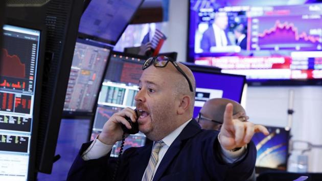 Trader Gaspare Urso works on the floor of the New York Stock Exchange.(Photo: AP)