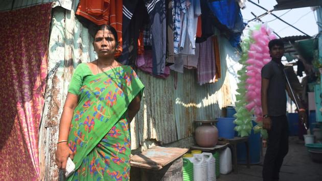 Saroj Ahire at the Colaba fisherman colony in Mumbai. At 50, Ahire was forced to take two jobs and work through the night to earn Rs15,000 a month, simply to keep her head above water. But the increase in income is no match for inflation, she said. “By the 25th of every month, I run out of cash and have to buy rice on loan from local shopkeepers,” the domestic worker told AFP. (Punit Paranjpe / AFP) Saroj Ahire at the Colaba fisherman colony in Mumbai. At 50, Ahire was forced to take two jobs and work through the night to earn Rs15,000 a month, simply to keep her head above water. But the increase in income is no match for inflation, she said. “By the 25th of every month, I run out of cash and have to buy rice on loan from local shopkeepers,” the domestic worker told AFP. (Punit Paranjpe / AFP)