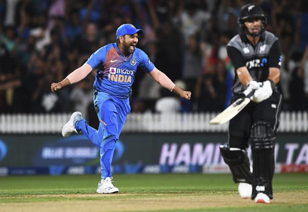 Rohit Sharma celebrates as New Zealand's Ross Taylor is bowled and the game is tied and goes to a super over. during the Twenty/20 cricket international between India and New Zealand in Hamilton. (AP) Rohit Sharma celebrates as New Zealand's Ross Taylor is bowled and the game is tied and goes to a super over. during the Twenty/20 cricket international between India and New Zealand in Hamilton. (AP)