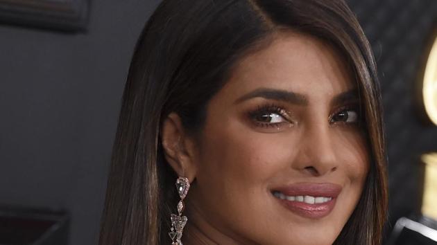 Priyanka Chopra and Nick Jonas at the 62nd annual Grammy Awards.(AP)