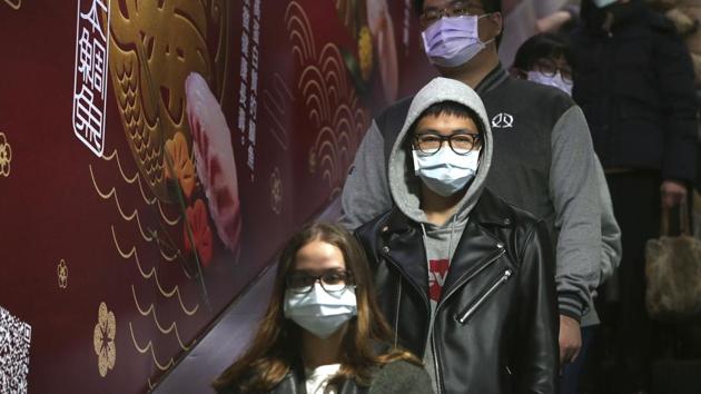 People wear masks at a metro station in Taipei, Taiwan.(AP)
