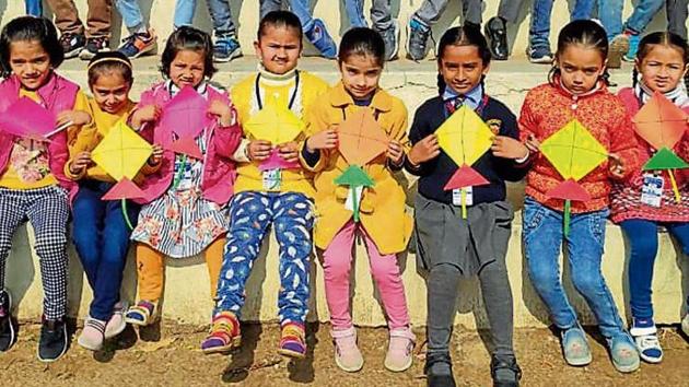 Students of DC Model Senior Secondary School with their kites.(HT)