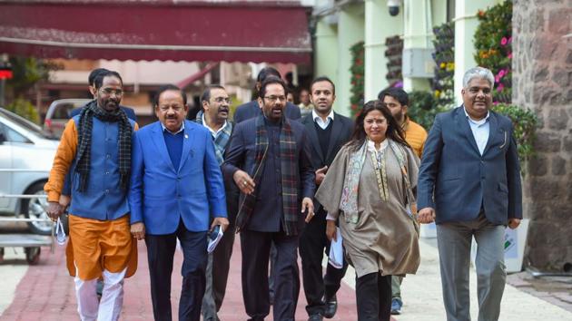 A BJP delegation comprising Union ministers Mukhtar Abbas Naqvi (C) and Harsh Vardhan (2nd L), MP Meenakshi Lekhi (2nd R, senior leader Bhupender Yadav (R) and other leaders comes out after meeting the Election Commission of India, at Nirvachan Sadan in New Delhi.(PTI)