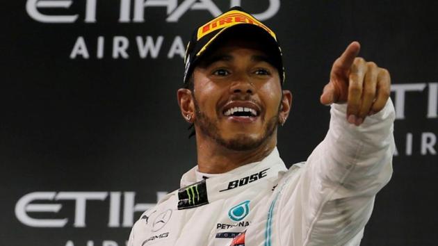 Mercedes' Lewis Hamilton celebrates with a trophy after winning the race.(REUTERS) Mercedes' Lewis Hamilton celebrates with a trophy after winning the race.(REUTERS)