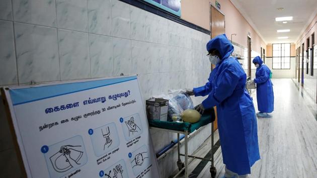 Medical staff with protective clothing are seen inside a ward specialised in receiving any person who may have been infected with coronavirus, at the Rajiv Ghandhi Government General hospital in Chennai.(REUTERS) Medical staff with protective clothing are seen inside a ward specialised in receiving any person who may have been infected with coronavirus, at the Rajiv Ghandhi Government General hospital in Chennai.(REUTERS)