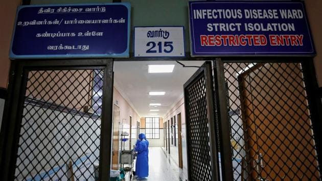 Medical staff with protective clothing are seen inside a ward specialised in receiving any person who may have been infected with coronavirus, at the Rajiv Ghandhi Government General hospital in Chennai.(REUTERS)