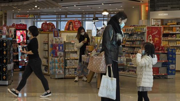 People wear face mask at a shopping mall in Hong Kong on Thursday. The death toll rose to 170 in the new virus outbreak in China on Thursday.(AP Photo) People wear face mask at a shopping mall in Hong Kong on Thursday. The death toll rose to 170 in the new virus outbreak in China on Thursday.(AP Photo)