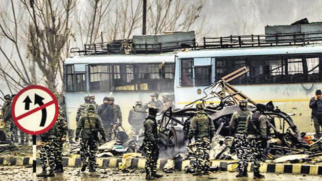 Security personnel carry out the rescue and relief works at the site of suicide bomb attack at Lathepora Awantipora in Pulwama district of south Kashmir.(PTI) Security personnel carry out the rescue and relief works at the site of suicide bomb attack at Lathepora Awantipora in Pulwama district of south Kashmir.(PTI)