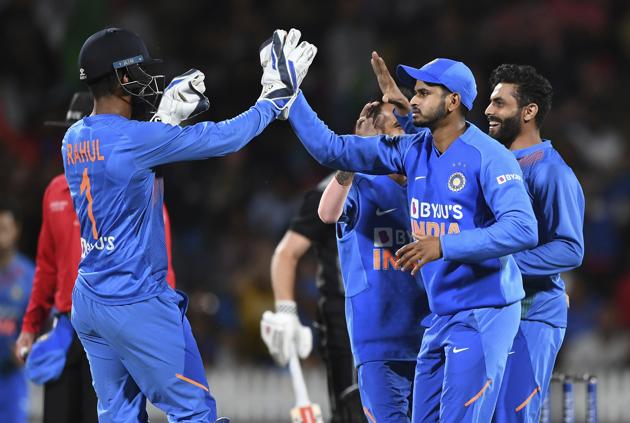 India players celebrate the wicket of Munro stumped by KL Rahul during the Twenty/20 cricket international between India and New Zealand in Hamilton. (AP) India players celebrate the wicket of Munro stumped by KL Rahul during the Twenty/20 cricket international between India and New Zealand in Hamilton. (AP)