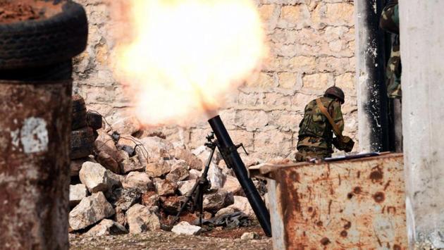 “Our armed forces continued operations in southern parts of Idlib with the aim of putting an end to crimes committed by terrorist groups,” said army spokesman Brig. Gen. Ali Mayhoub to AP. He listed more than a dozen villages and towns captured, including Maaret al-Numan. (Ghaith Alsayed / AP) “Our armed forces continued operations in southern parts of Idlib with the aim of putting an end to crimes committed by terrorist groups,” said army spokesman Brig. Gen. Ali Mayhoub to AP. He listed more than a dozen villages and towns captured, including Maaret al-Numan. (Ghaith Alsayed / AP)